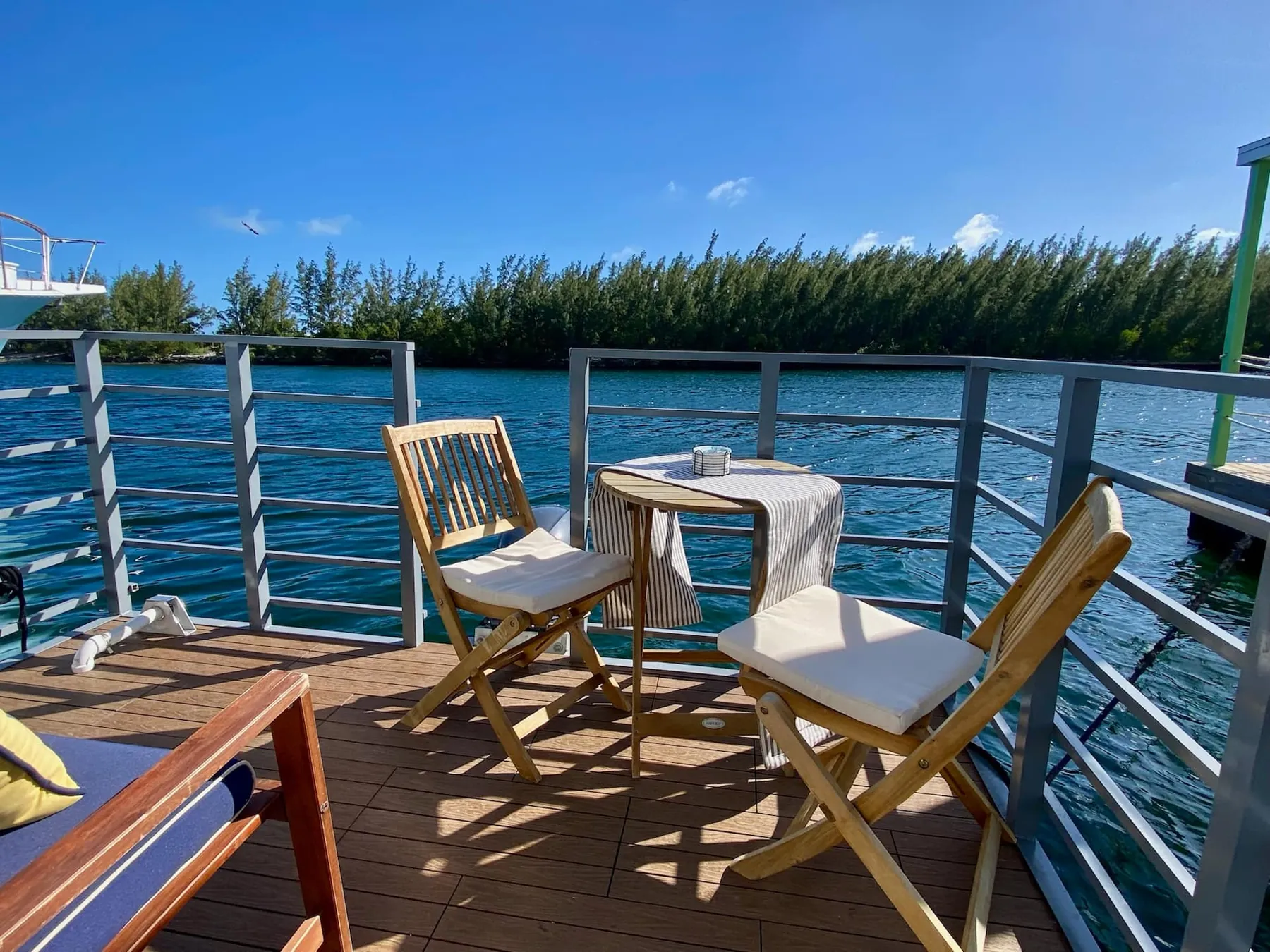 Turquoise water and mangroves seen from the Casa Azul houseboat deck on Stock Island